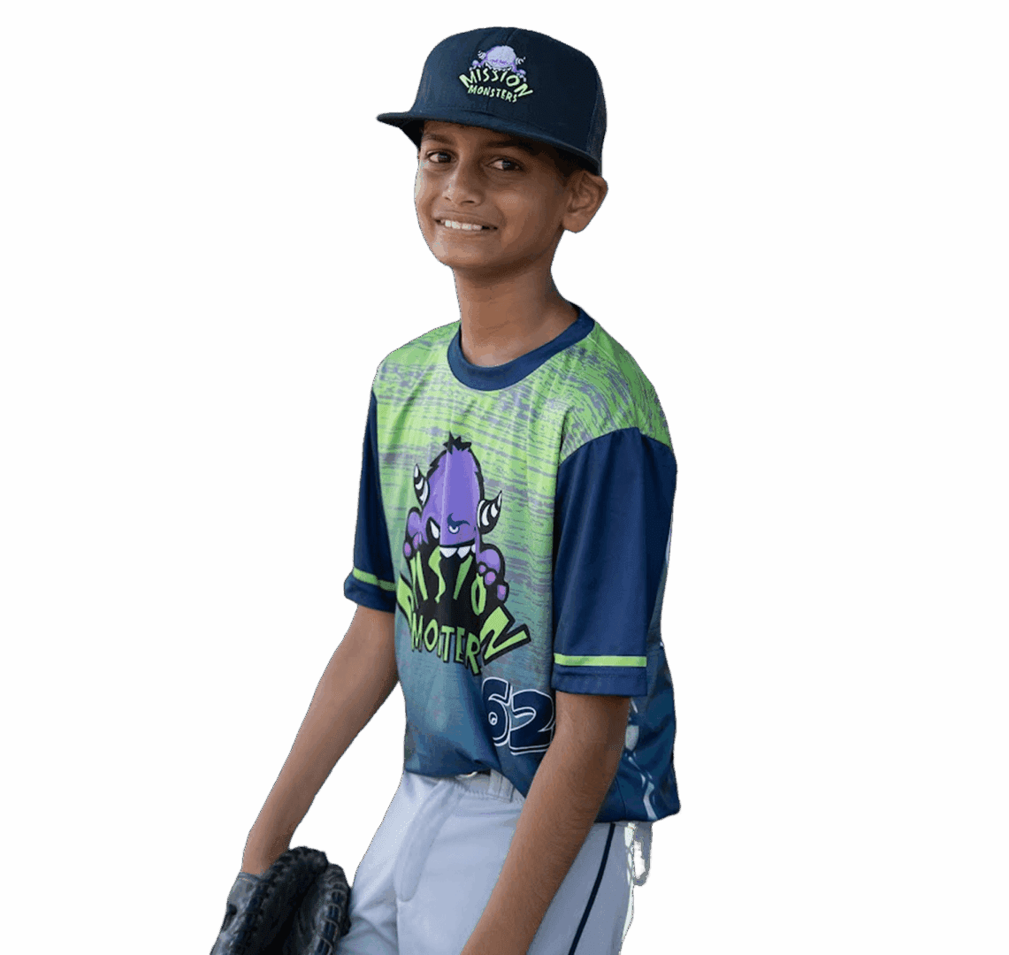 Young boy in baseball uniform holding a glove, smiling.